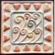 AZULEJO DECORATIVO TACO VIENTO MARRON   10x10cm.