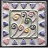 AZULEJO DECORATIVO TACO VIENTO MORADO   10x10cm.